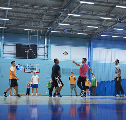 men playing handball in a gym