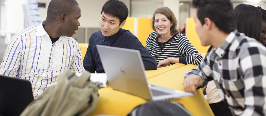 A group of students having a discussion.