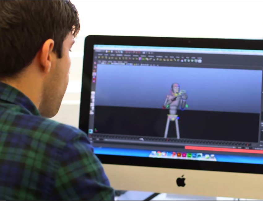 Student modelling a character on a computer