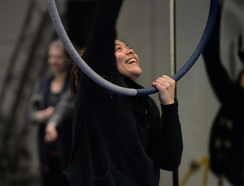 Student learning aerial acrobatics
