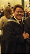 young man wearing graduation robes
