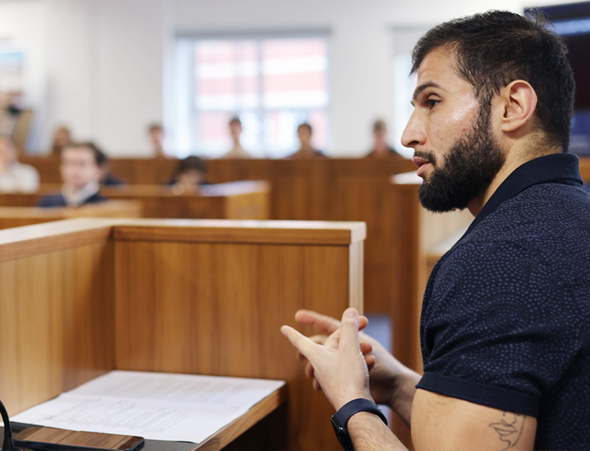A speaker addressing a mock trial in our courtroom