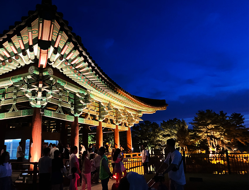 Traditional South Korean architecture lit up at night