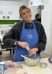 University of Worcester logo on a light blue background