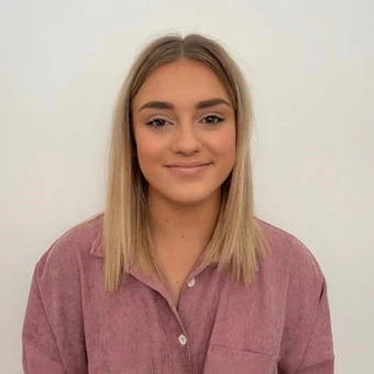 University of Worcester logo on a light blue background