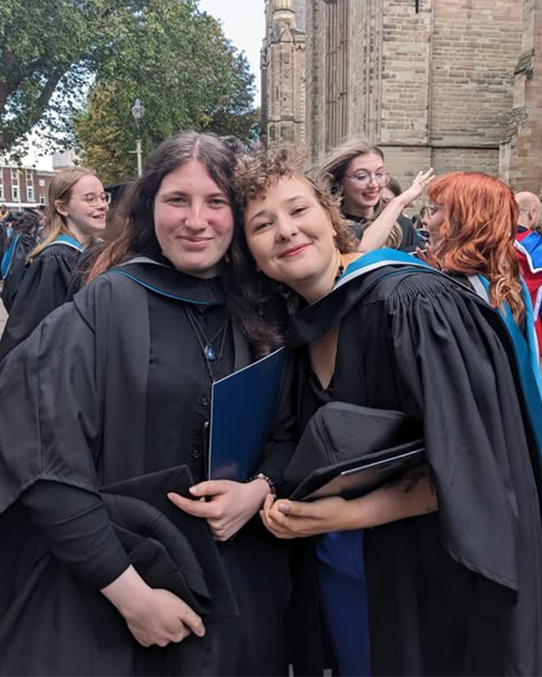 University of Worcester logo on a light blue background
