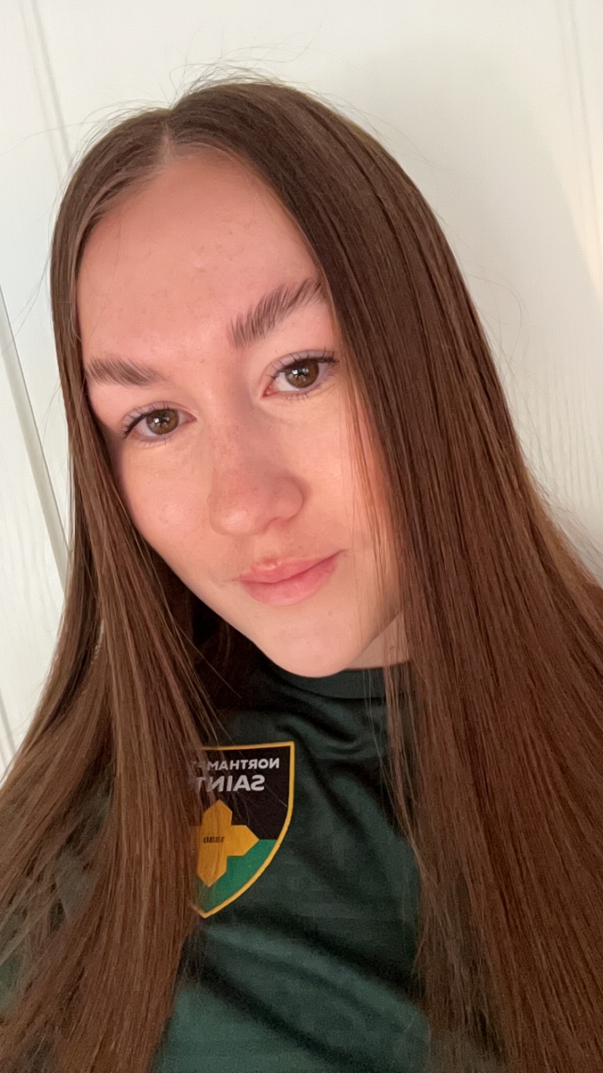 University of Worcester logo on a light blue background