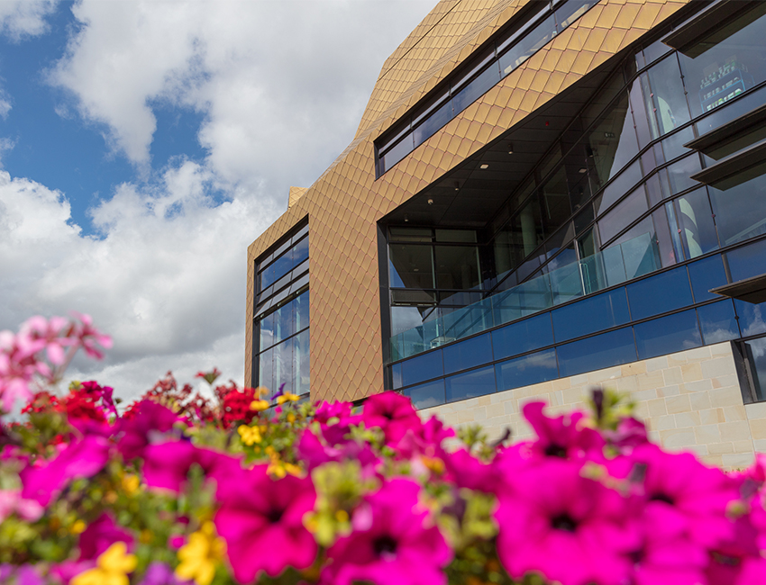Students walking outside our St John's Campus main reception