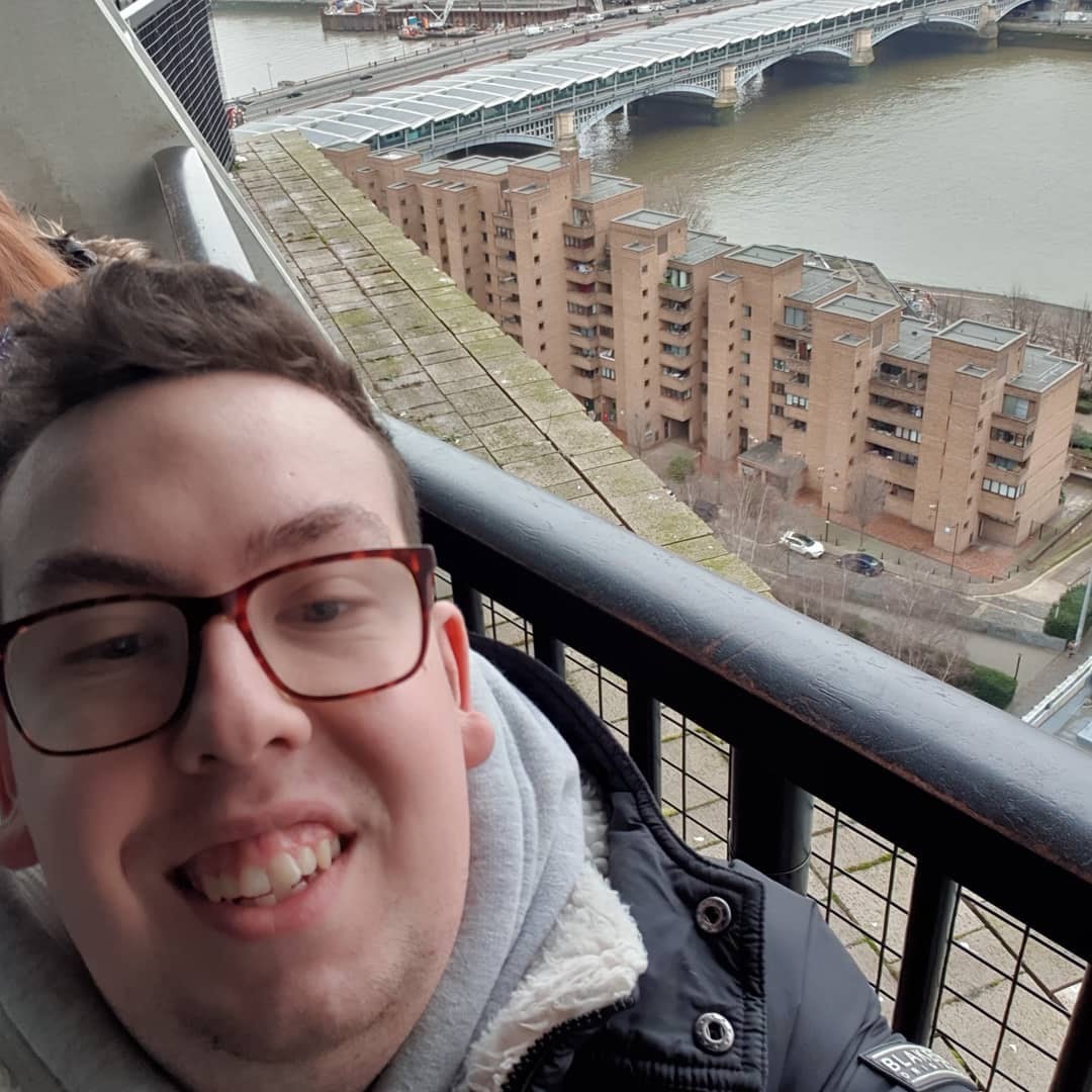 University of Worcester logo on a light blue background