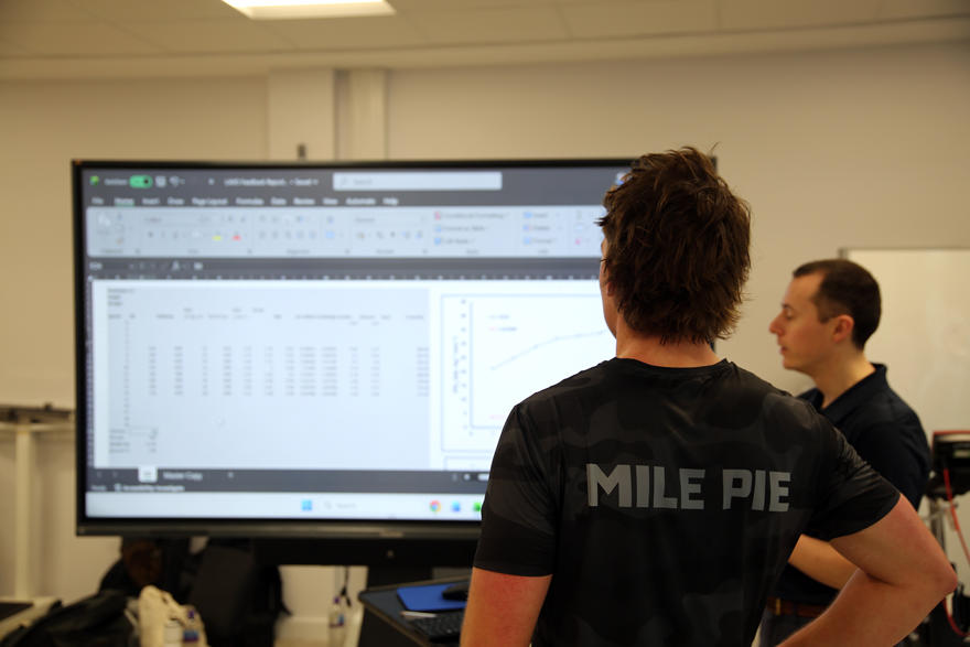 Joe looks at a screen while his results are analysed