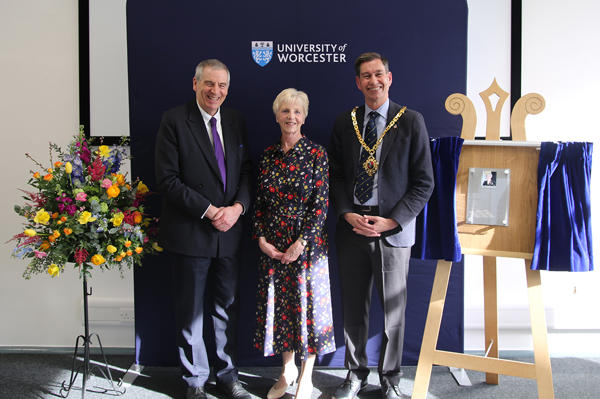 David Green, Margaret Jones and Matt Lamb in a photo with the plaque against a blue background