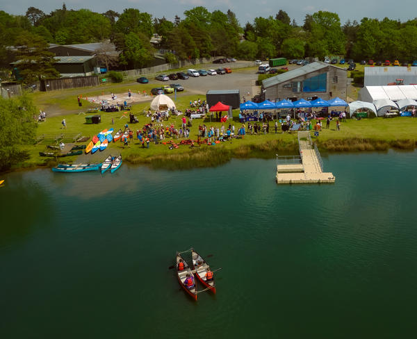 A photo of the festival taken from a camera drone, with crowds below
