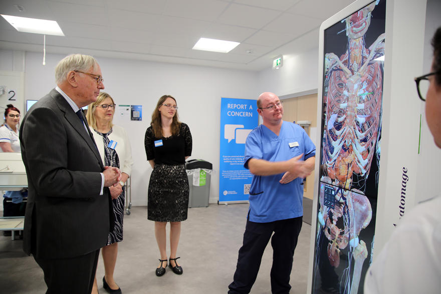 The Duke of Gloucester is given a demonstration of medical training equipment