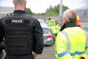 A shot of two police officers talking
