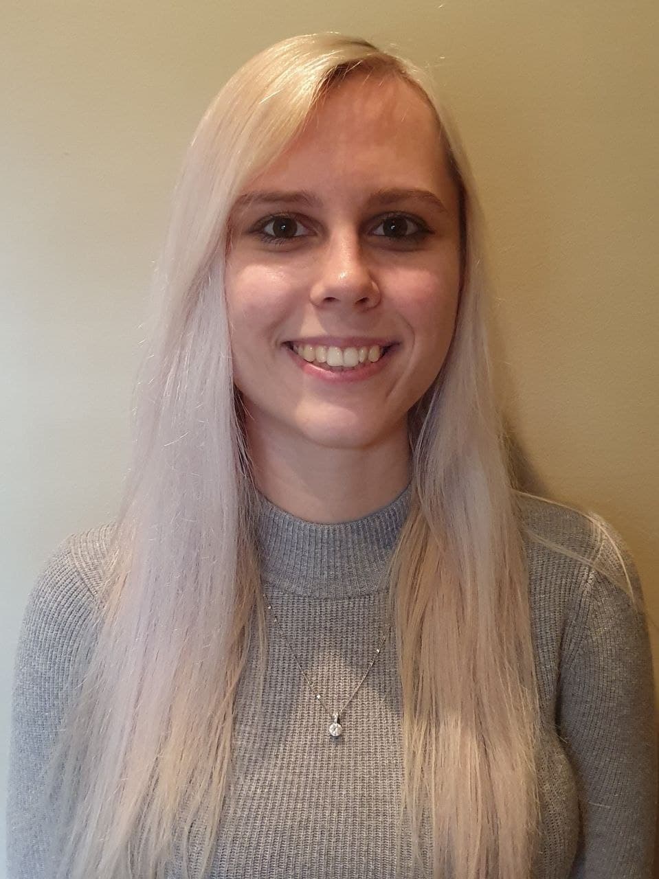 University of Worcester logo on a light blue background