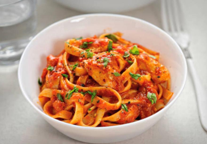Pasta in a tomato sauce served in a bowl