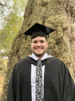 University of Worcester logo on a light blue background
