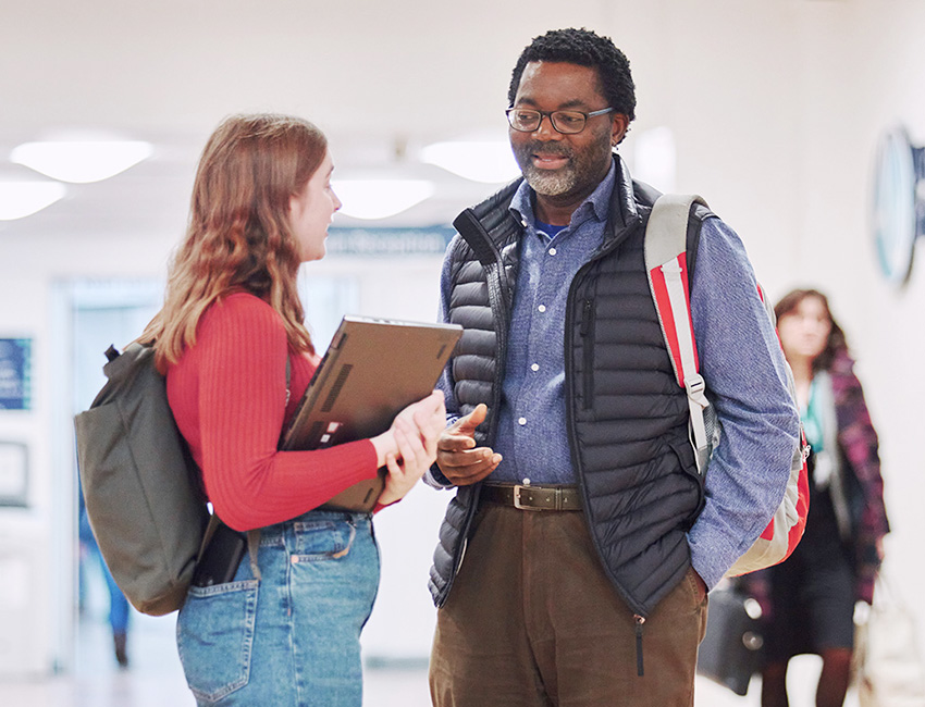 A student speaking to a lecturer