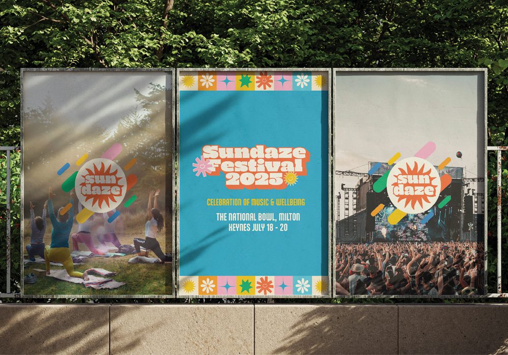 Three festival posters displayed outdoors, featuring yoga participants, a colorful Sundaze Festival 2025 announcement.