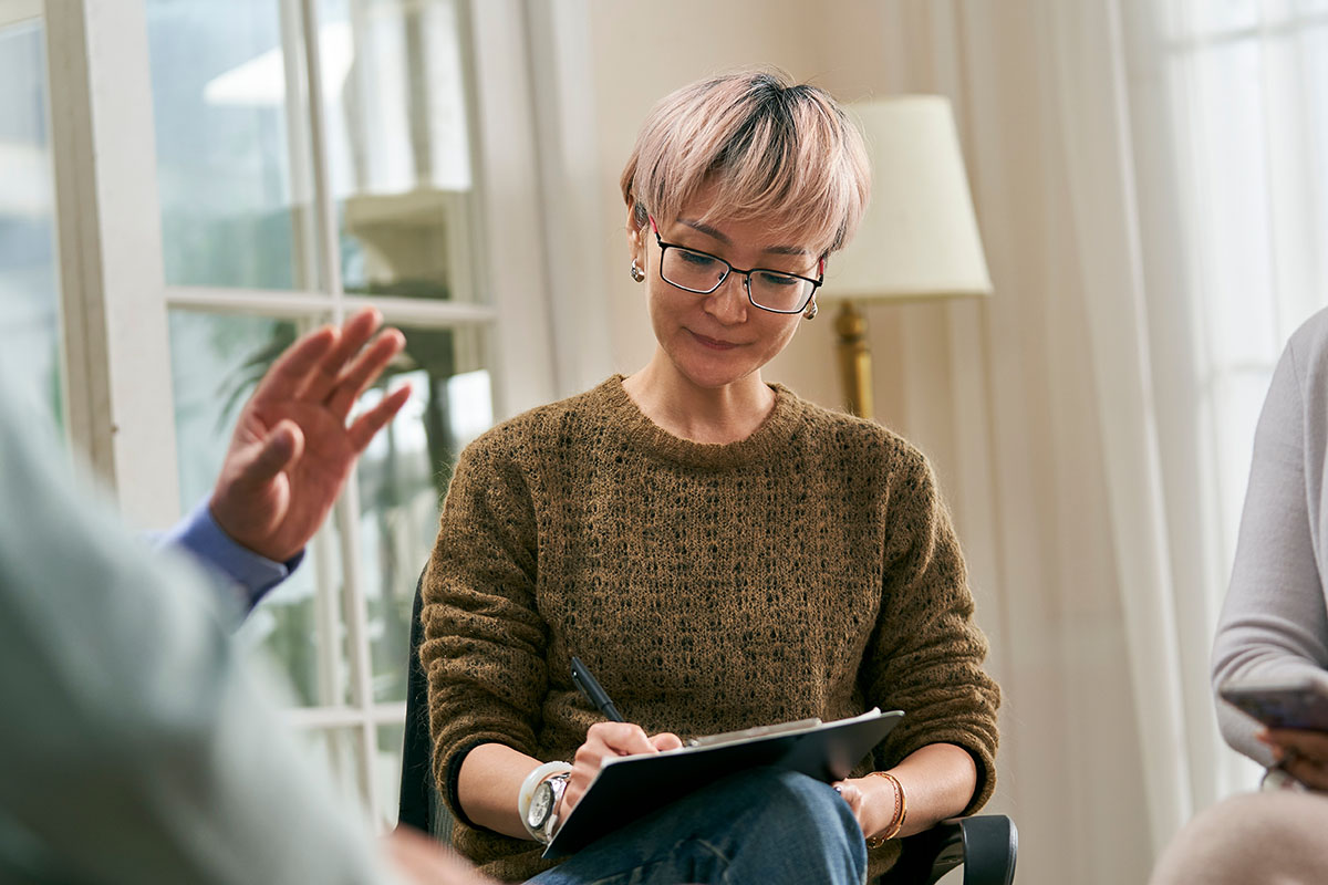 Care manager in team meeting