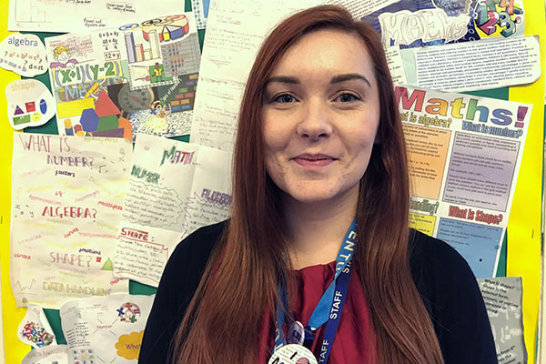 University of Worcester logo on a light blue background