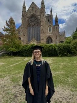 University of Worcester logo on a light blue background