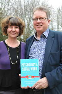 Dr Gabriela Misca and Dr Peter Unwin with their book