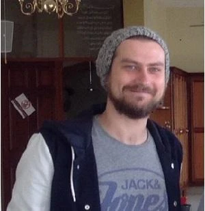 University of Worcester logo on a light blue background