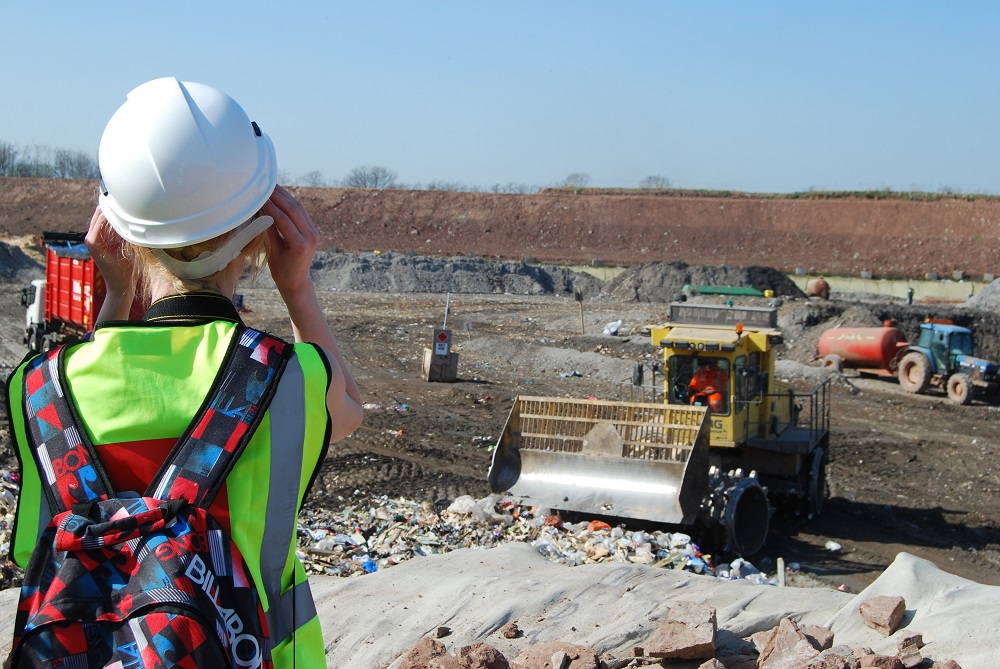 back of student with binoculars