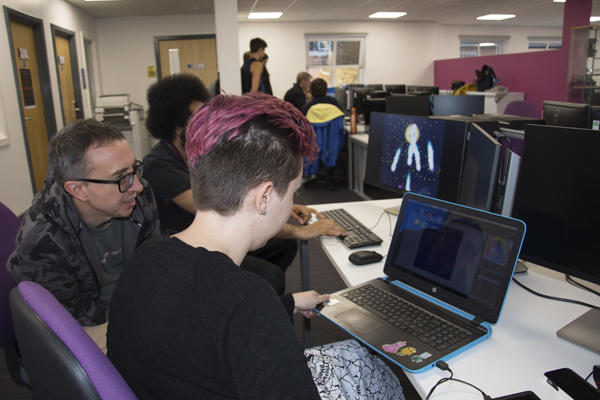 Students working with Game Art visiting speakers