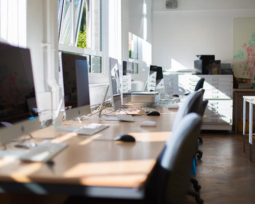 Row of iMacs in teaching space