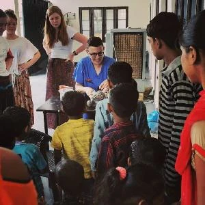 University of Worcester logo on a light blue background