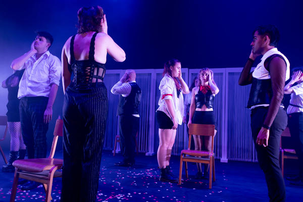 People performing theatre
