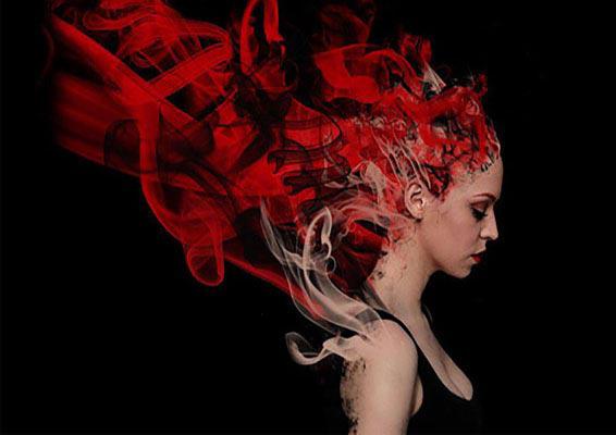 Graphic design degree course student artwork - woman with red hair dissolving into flames