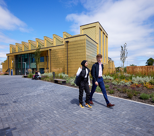 Students walking outside the Elizabeth Garratt Anderson building