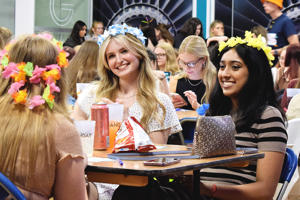 A group of students in the Hangar during a Welcome event