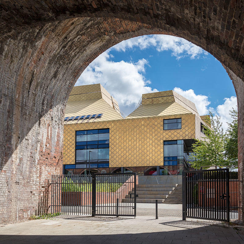 view of the hive library through an arch