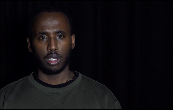 man's face with a black background
