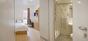 inside a student bedroom and bathroom