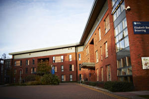 outside view of brown accommodation buildings
