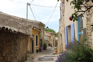 cramped and wonky street enclosed by houses