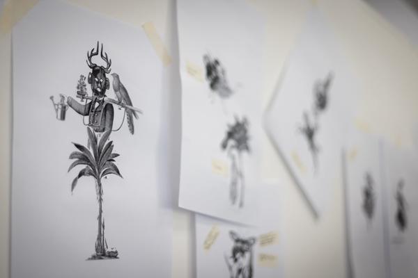 Pieces of illustration hung on wall