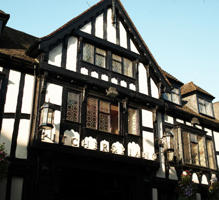 the front of a georgian black and white building