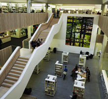 elevated view of the stairs and ground floor of the hive library