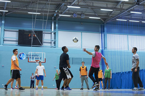 men playing handball in a gym