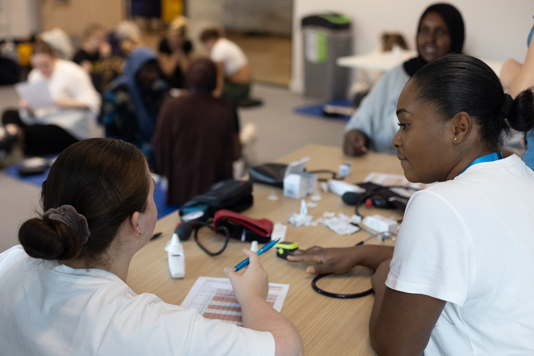 Midwifery students discussing course