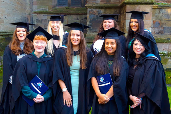 Special Educational Needs, Disabilities and Inclusion students in graduation robes