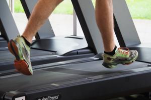 view of feet on a running machine