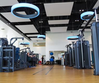 low view of the gym with equipment either side