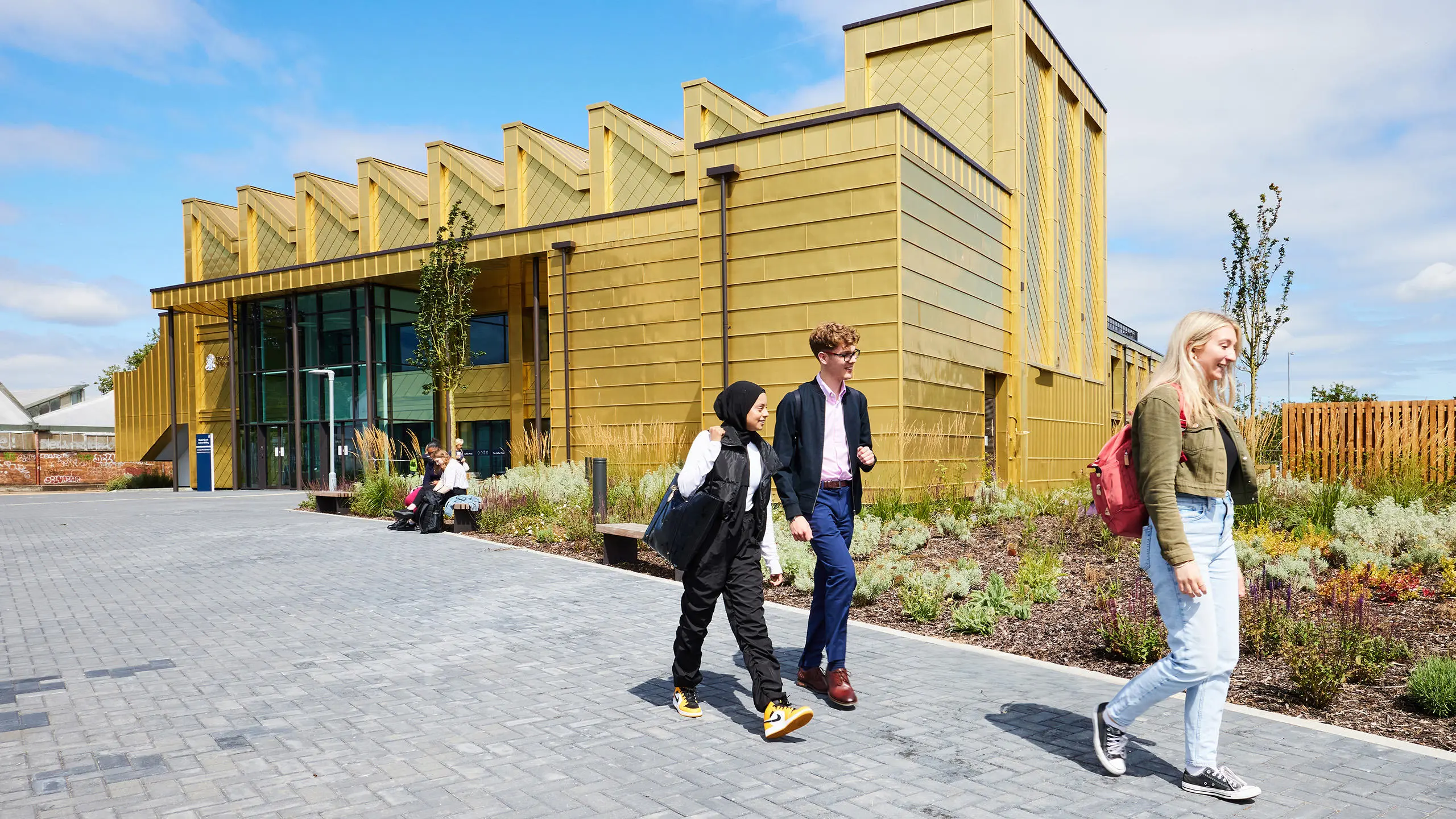 Students walking outside the Elizabeth Garrett Anderson building